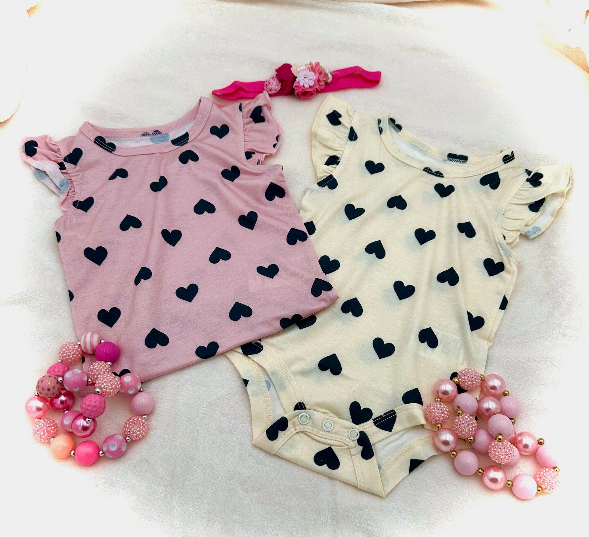 Pink Baby Romper With Hearts and Ruffled Sleeve